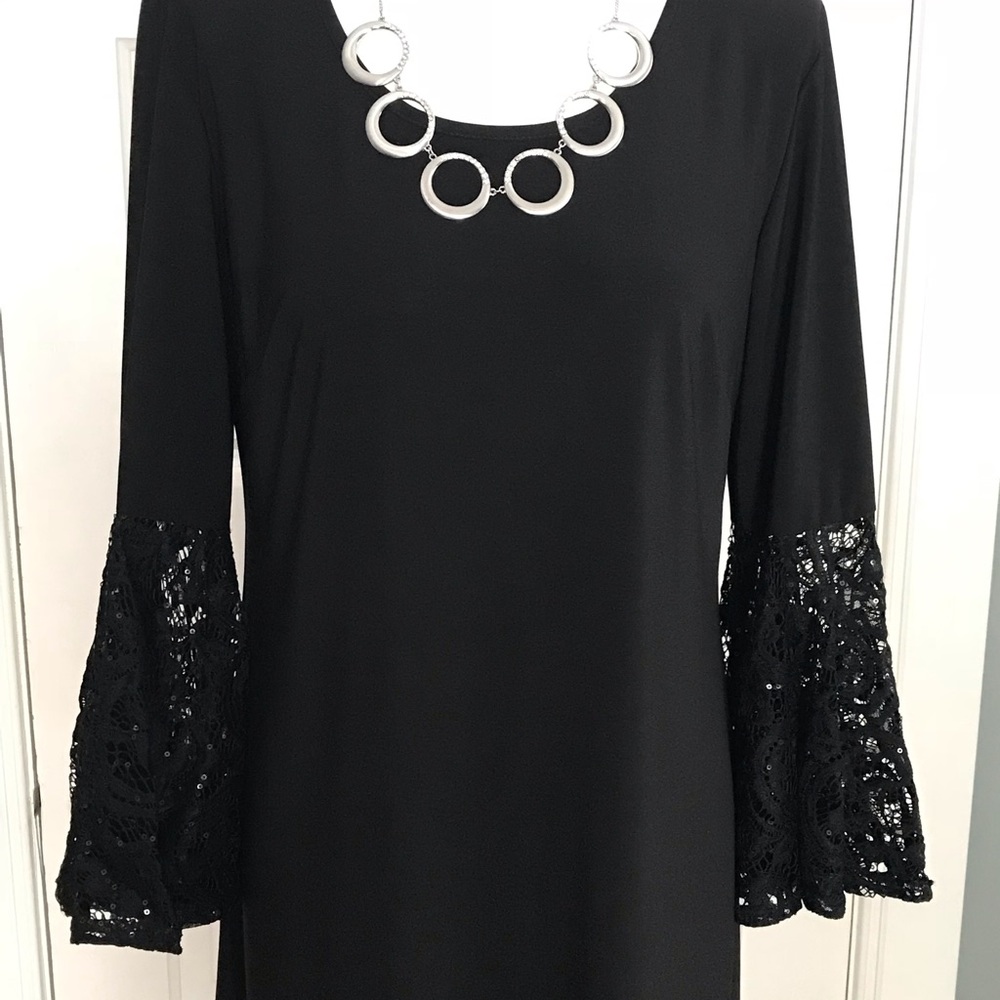 Elegant black evening dress Size 12 Never worn